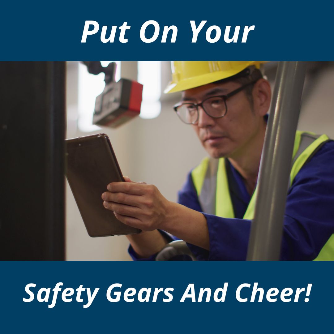 Worker in Safety Gear Using Digital Tablet in Industrial Worksite