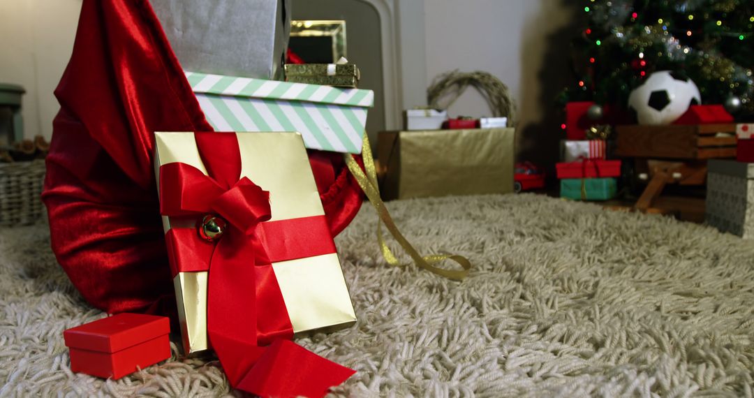 Festive Christmas Living Room with Wrapped Gifts - Free Images, Stock Photos and Pictures on Pikwizard.com