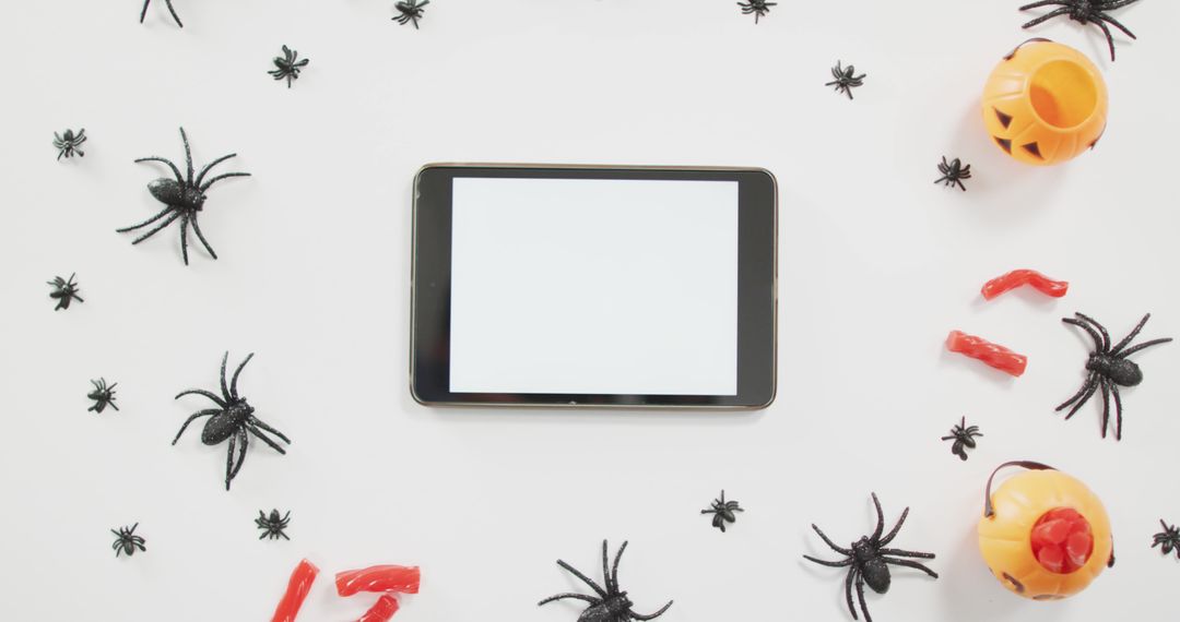 Halloween Celebrations Featuring Blank Tablet for Festive Designs - Free Images, Stock Photos and Pictures on Pikwizard.com