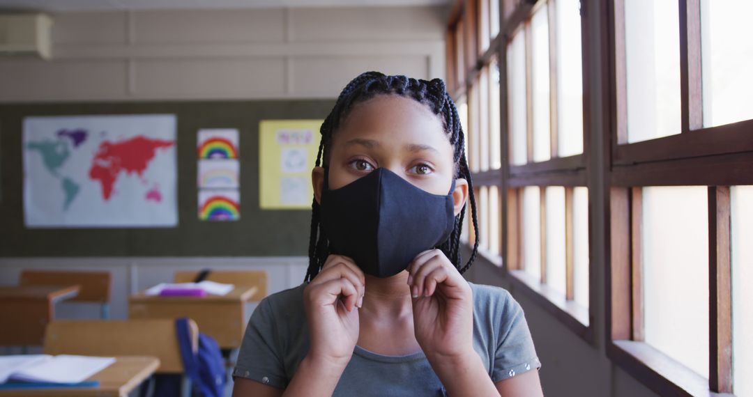 Young Student in Classroom Wearing Face Mask - Free Images, Stock Photos and Pictures on Pikwizard.com