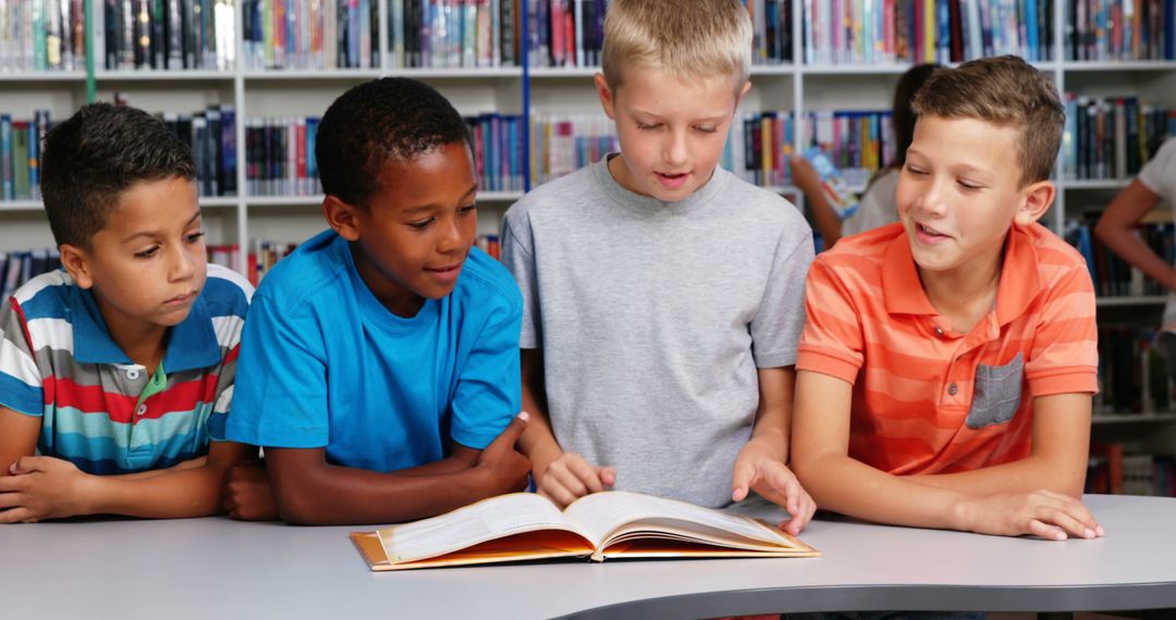 Children Reading Book Together at Library Table - Free Images, Stock Photos and Pictures on Pikwizard.com