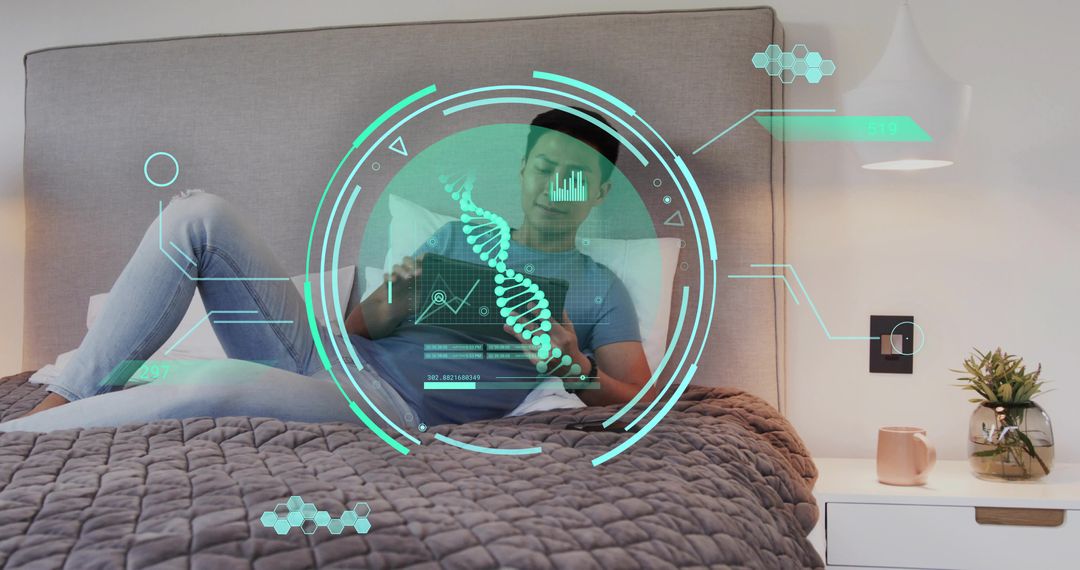 Relaxing Asian man using tablet with holographic DNA interface on modern bedroom bed