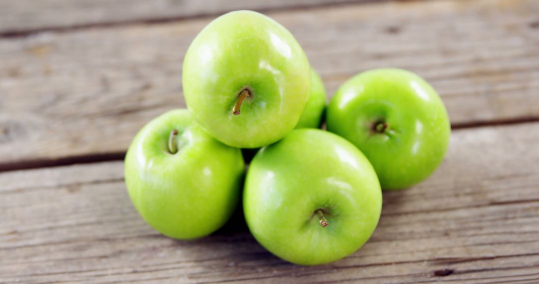 Fresh Green Apples on Rustic Wooden Table - Free Images, Stock Photos and Pictures on Pikwizard.com