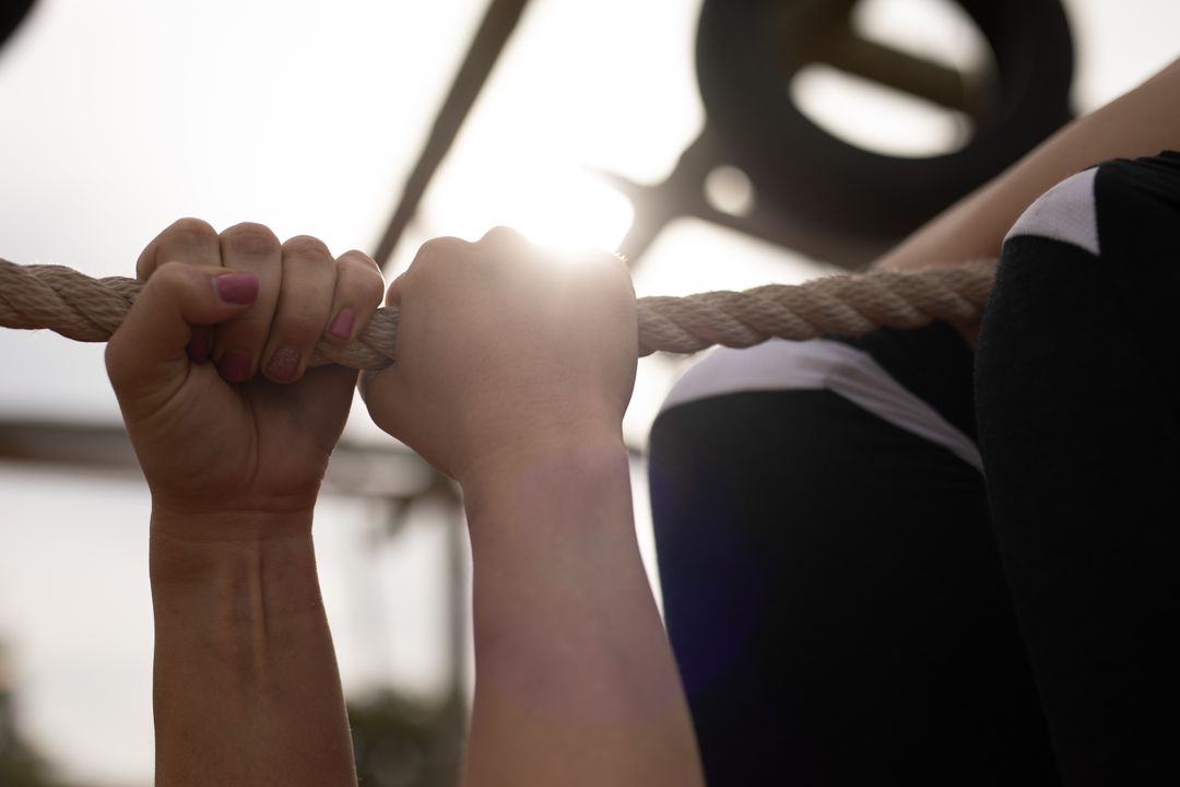 Close-Up of Hands Holding Rope During Outdoor Boot Camp Exercise - Free Images, Stock Photos and Pictures on Pikwizard.com