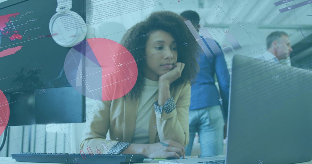 Businesswoman Analyzing Data on Computer at Modern Office