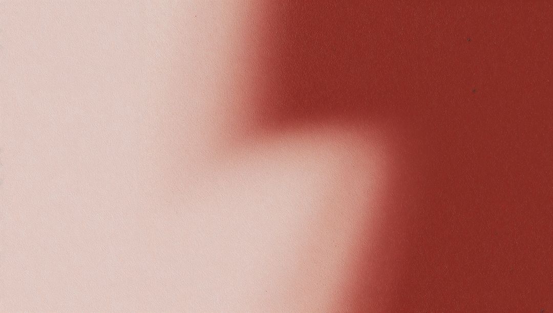 Soft Duotone Gradient on Textured Wall, Pale Pink to Deep Red, Minimal Abstract Background