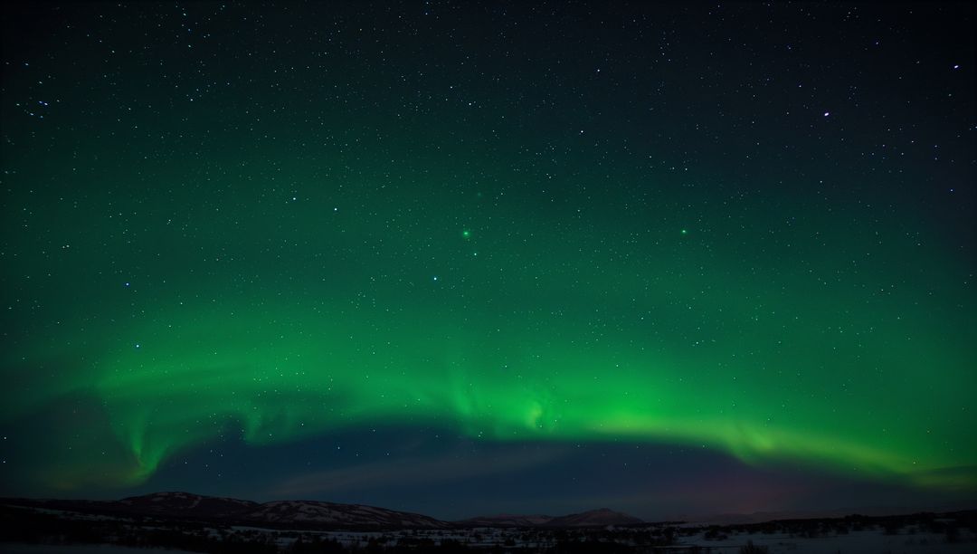 Dancing Green Aurora Stretching Over Snowy Arctic Tundra Under Starry Sky