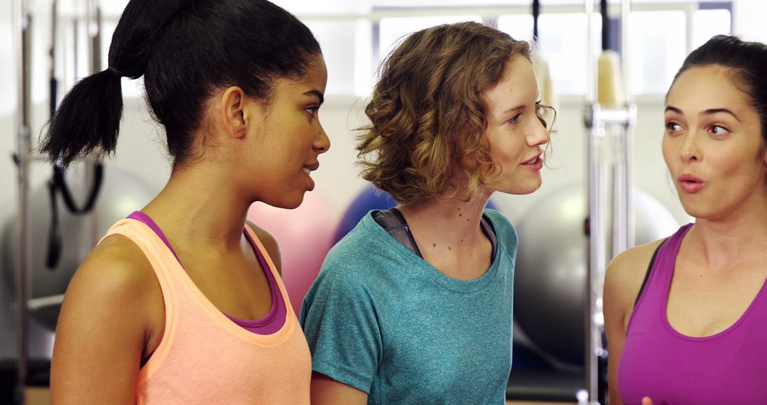 Three Women Chatting at the Gym in Activewear - Free Images, Stock Photos and Pictures on Pikwizard.com