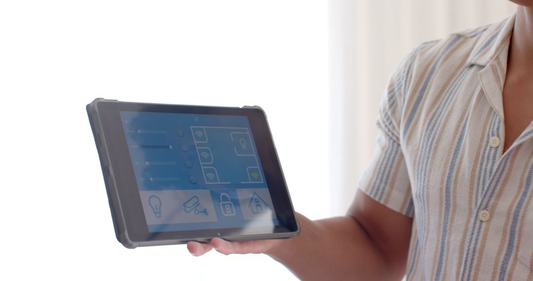 Smart Home Control on Tablet Displayed by Window