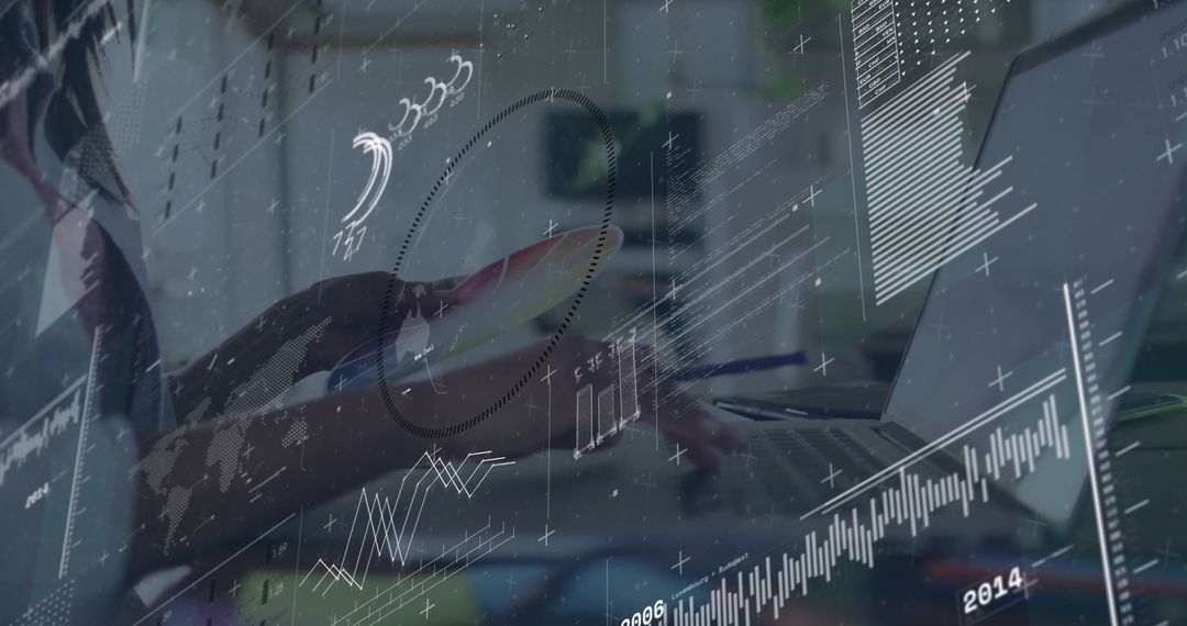 Digital Workspace with Analytics Graphs Surrounding Laptop