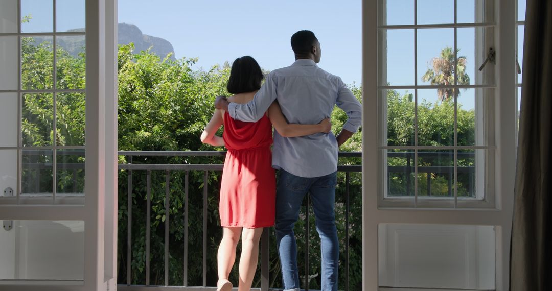 Couple Enjoying Scenic View from Balcony