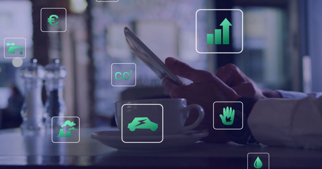 Executive tapping tablet in cafe using digital green sustainability and finance icons