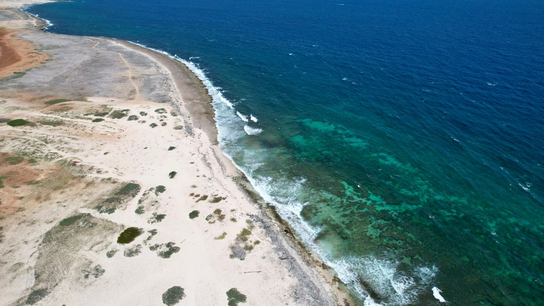 Pristine Coastal Landscape with Turquoise Waters and Sandy Beach