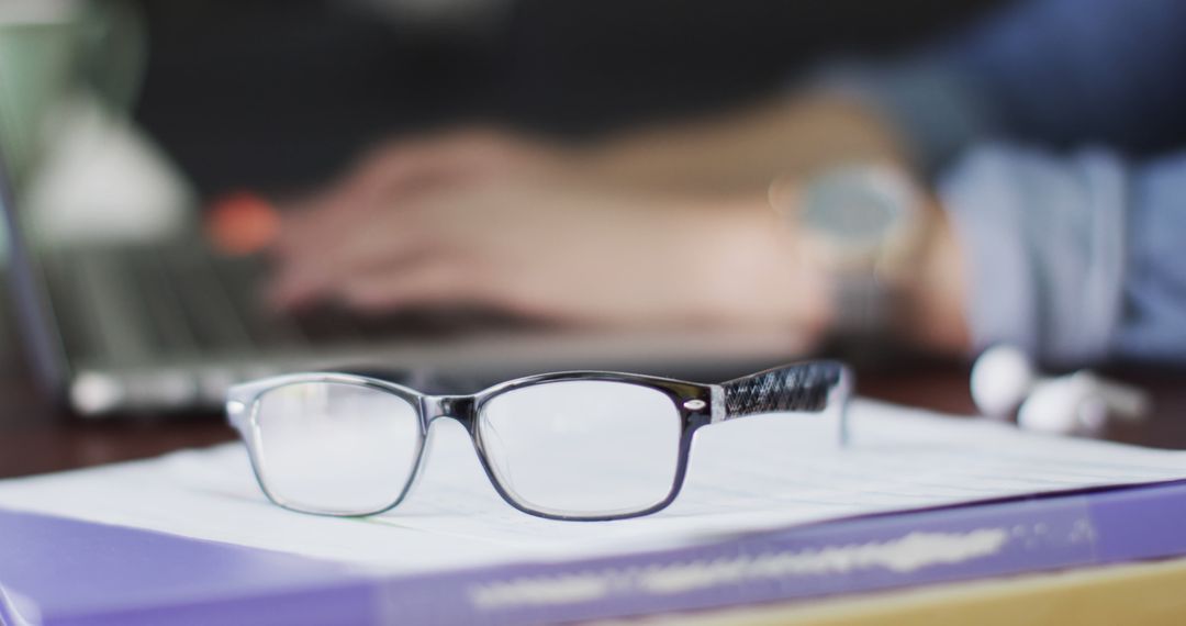 Close-up of Eyeglasses on Desk with Blurred Background - Free Images, Stock Photos and Pictures on Pikwizard.com