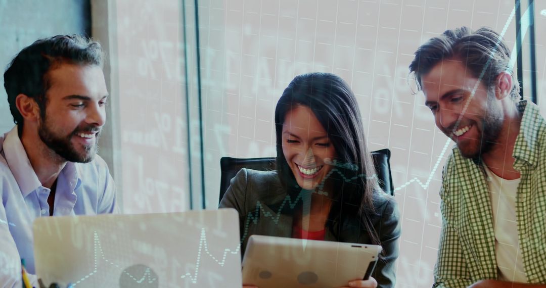 Diverse Business Team Analyzing Financial Data on Digital Tablets