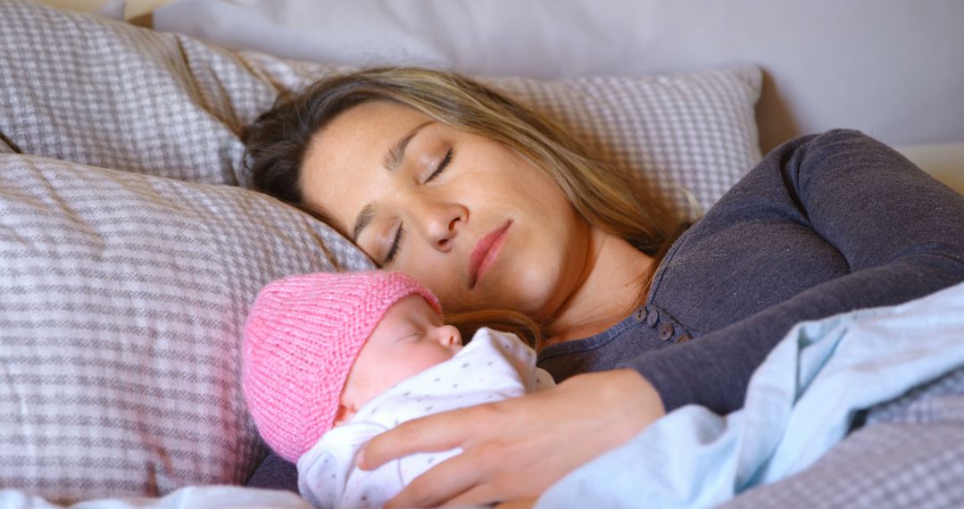 Mother Sleeping with Newborn Baby in Bed - Free Images, Stock Photos and Pictures on Pikwizard.com