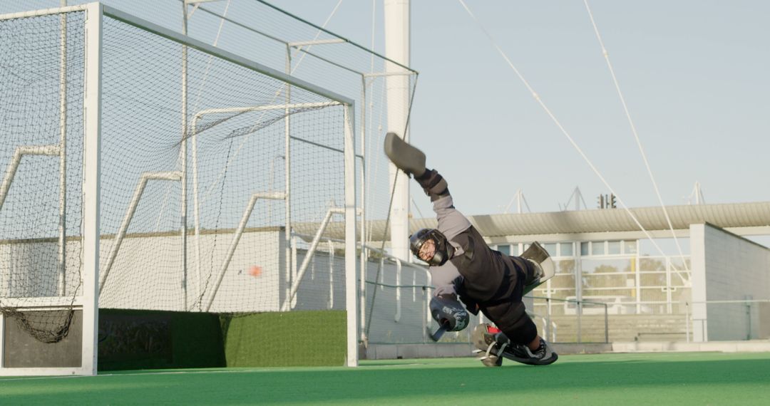 Field Hockey Goalie Diving to Make a Save in Intense Match - Free Images, Stock Photos and Pictures on Pikwizard.com