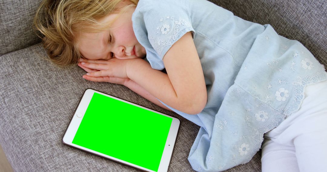 Young Girl Napping with Tablet and Green Screen at Home - Free Images, Stock Photos and Pictures on Pikwizard.com