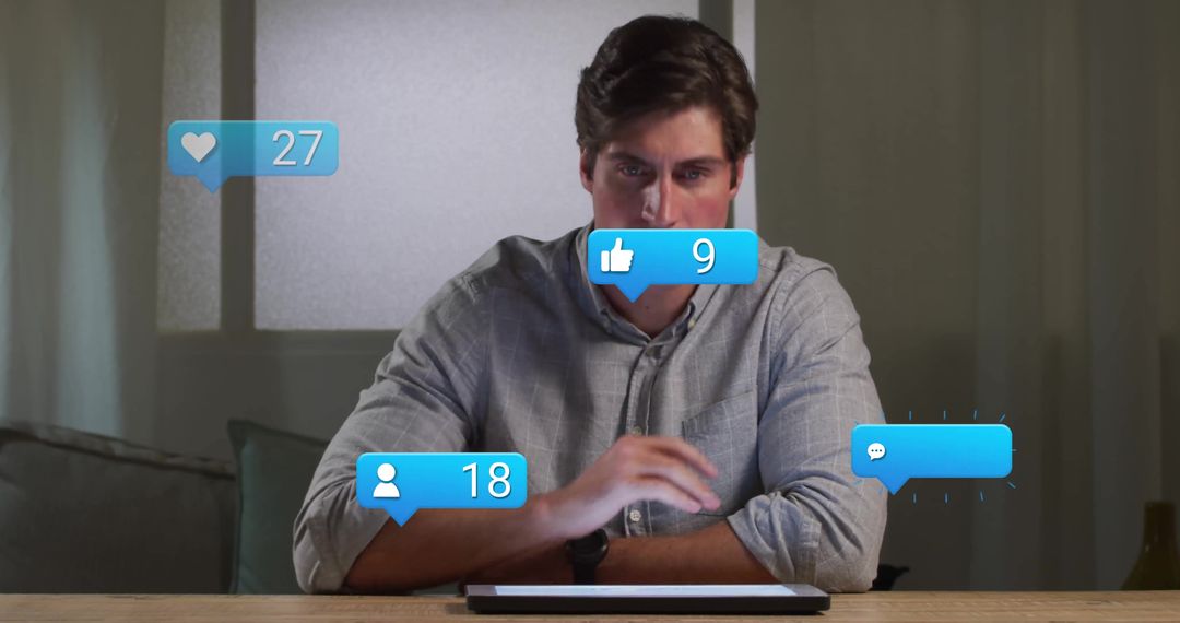 Man Using Tablet with Social Media Notifications in Modern Home