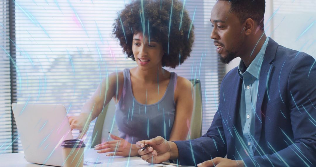 Professionals Collaborating in Modern Office with Data Visualization Overlays