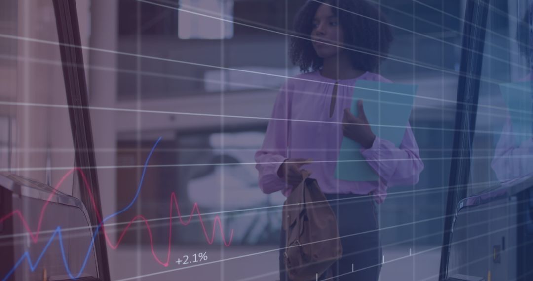 Businesswoman Overlaid with Financial Data Charts and Graphs