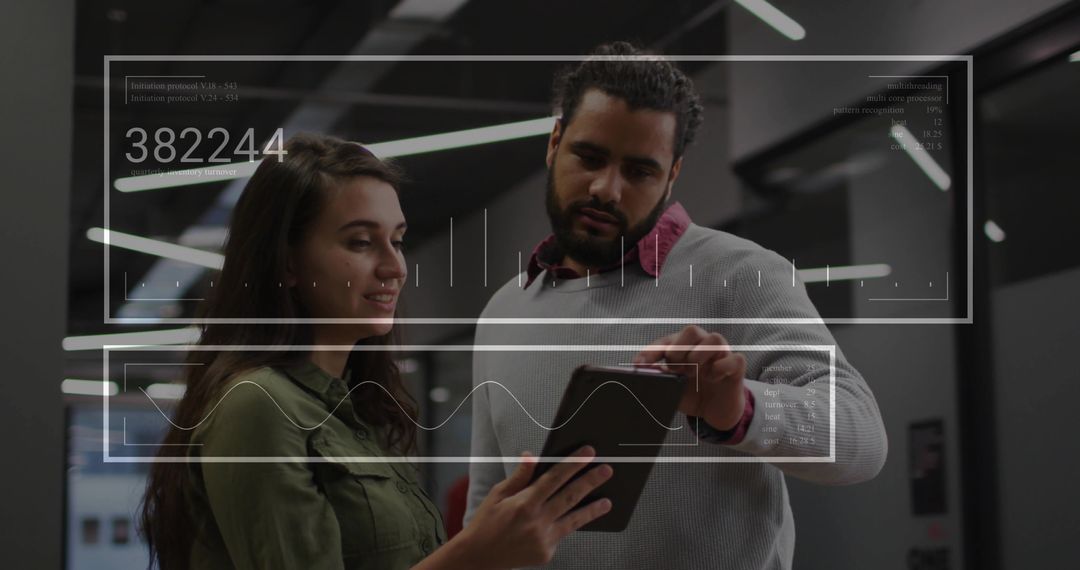 Business Professionals Reviewing Tablet Data with Tech Overlays