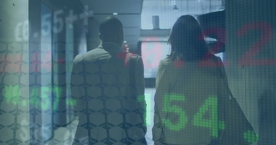 Rear View of Coworkers Walking with Stock Market Overlay