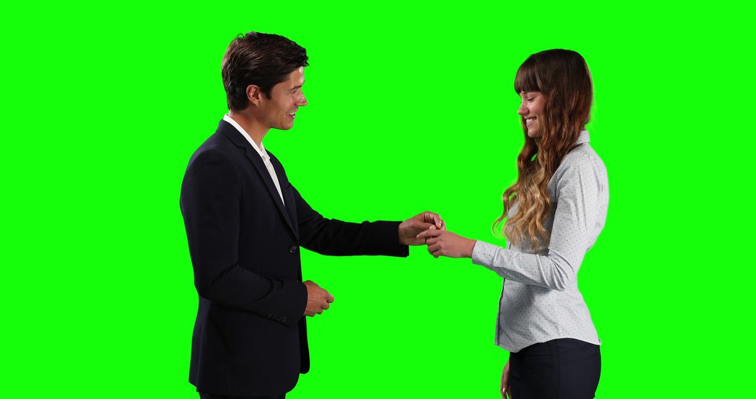 Professional Man Giving Business Card to Woman on Green Screen - Free Images, Stock Photos and Pictures on Pikwizard.com