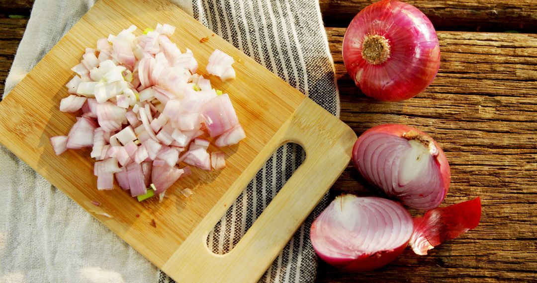 Fresh Red Onions Diced on Wooden Cutting Board Outdoors - Free Images, Stock Photos and Pictures on Pikwizard.com