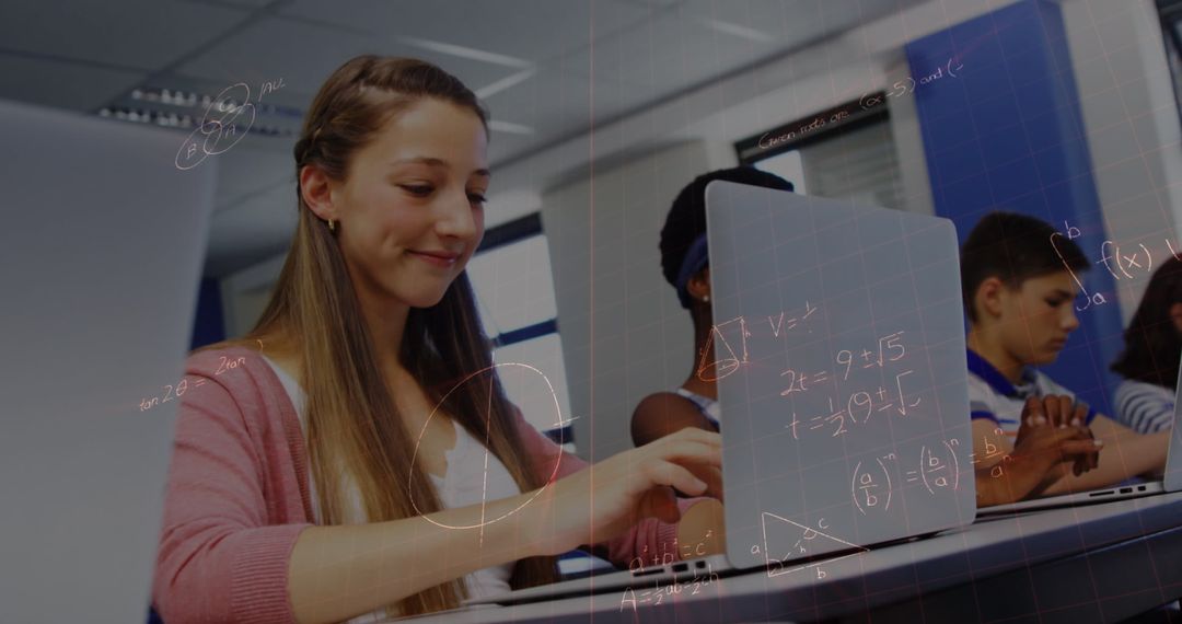 Students Learning Math with Laptops in Modern Classroom