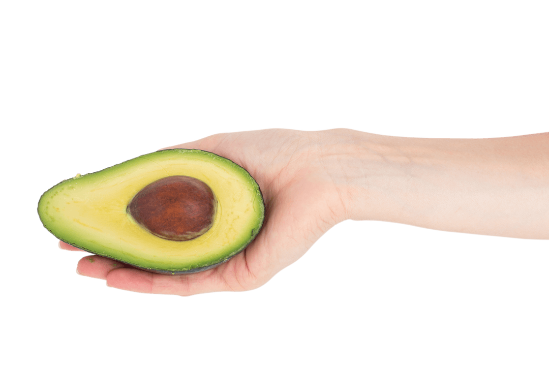 Hand Holding Fresh Avocado Half on Transparent Background