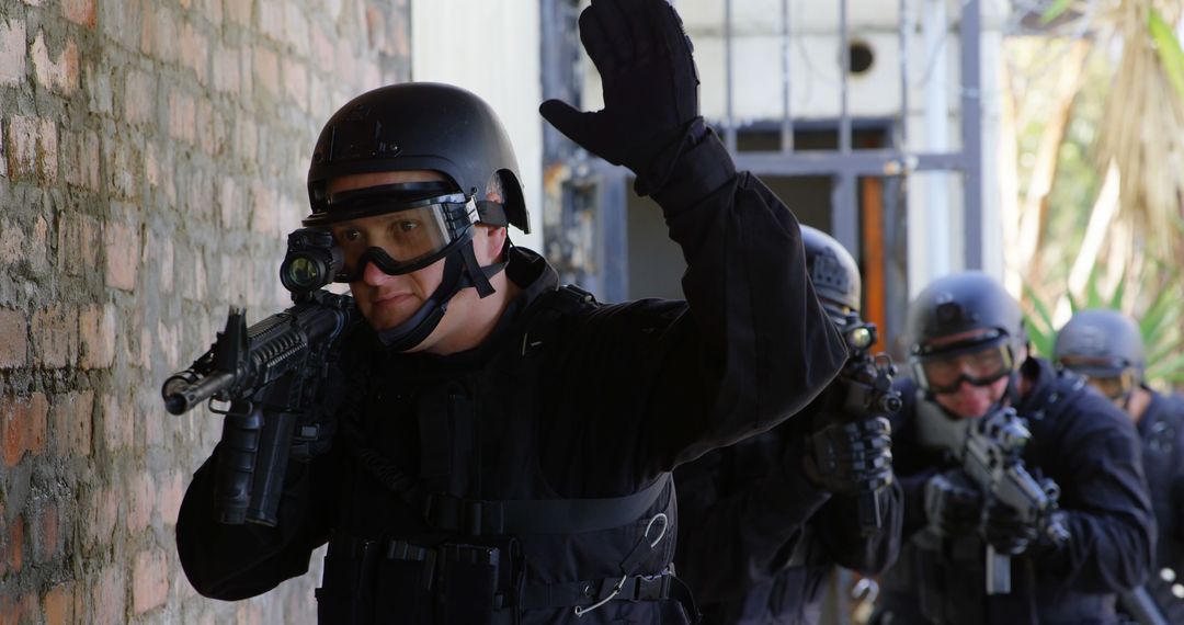 SWAT Team in Action, Armed Officers Conducting Building Raid - Free Images, Stock Photos and Pictures on Pikwizard.com