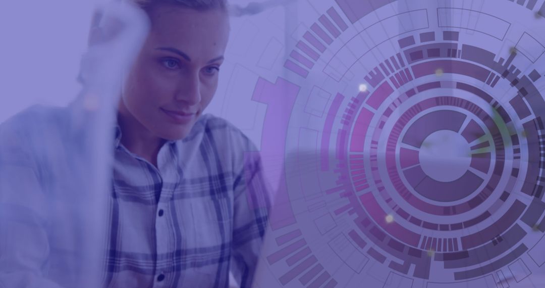 Businesswoman Working on Laptop with Digital Interface Overlay