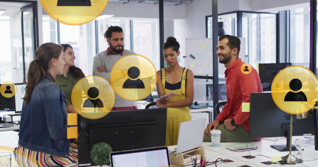 Diverse Team Collaborating on Social Media Strategy in Modern Office