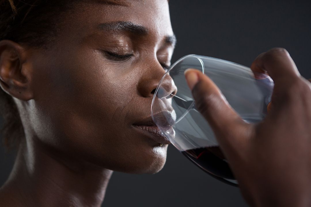 Close-up of Androgynous Person Drinking Red Wine - Free Images, Stock Photos and Pictures on Pikwizard.com