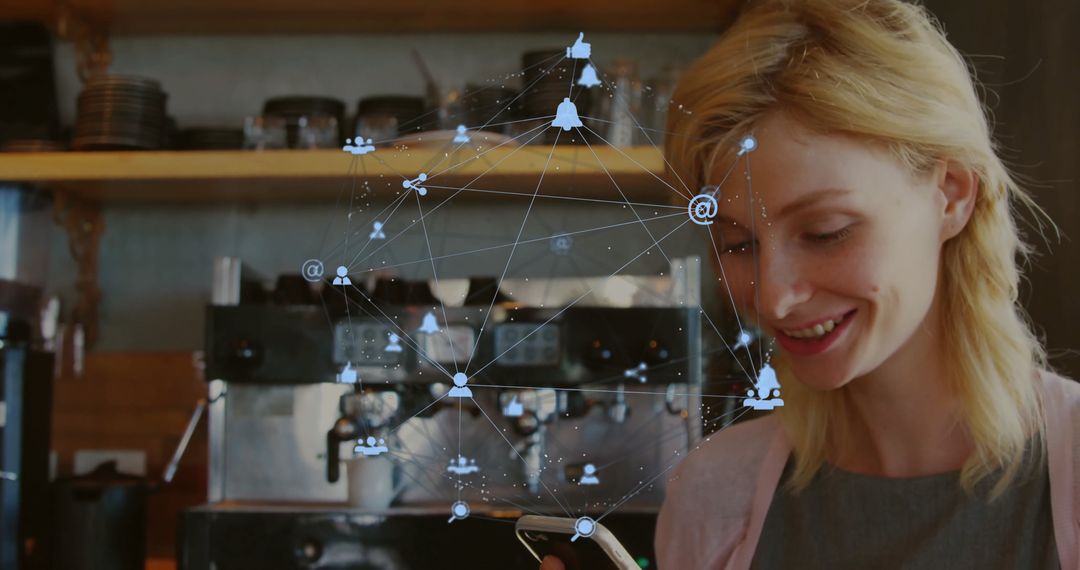 Barista Interacting with Digital Network Behind Café Counter