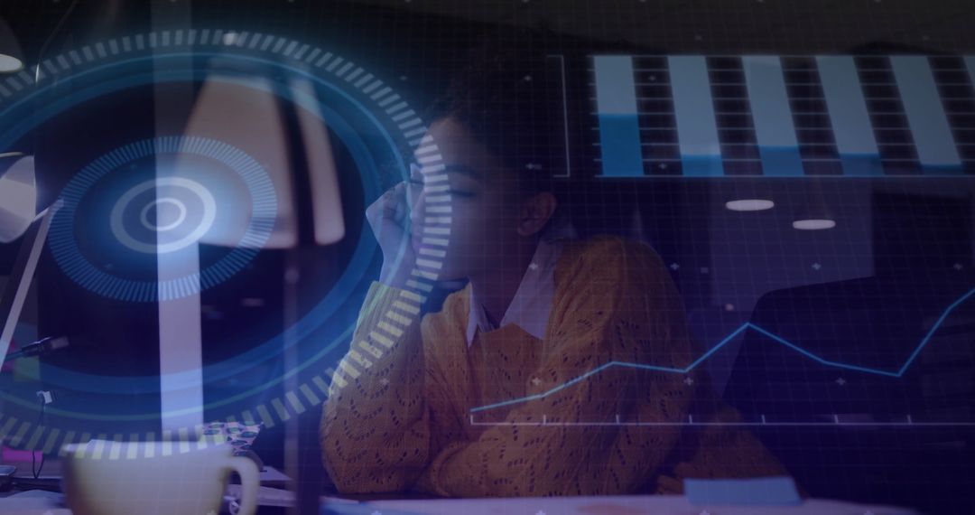 Woman Focusing on Digital Charts in Modern Office