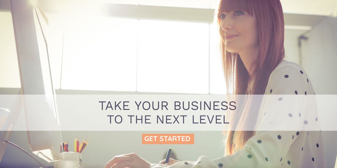 Determined Woman Working at Desk: Promoting Business Growth and Success