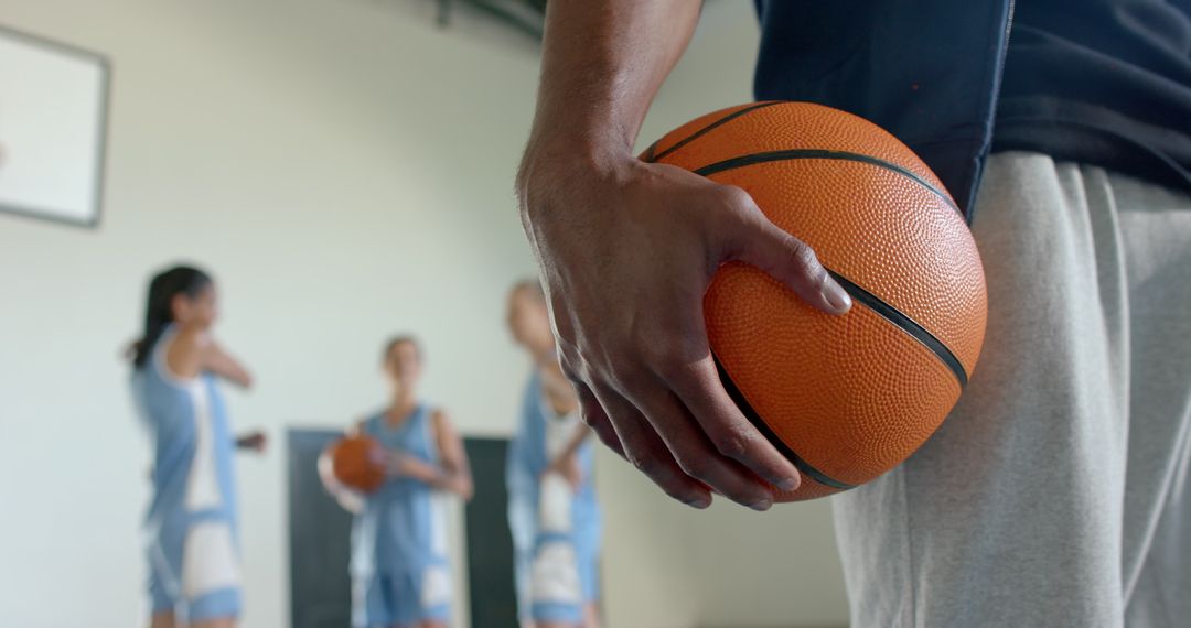 Youth Basketball Practice with Coach Focused