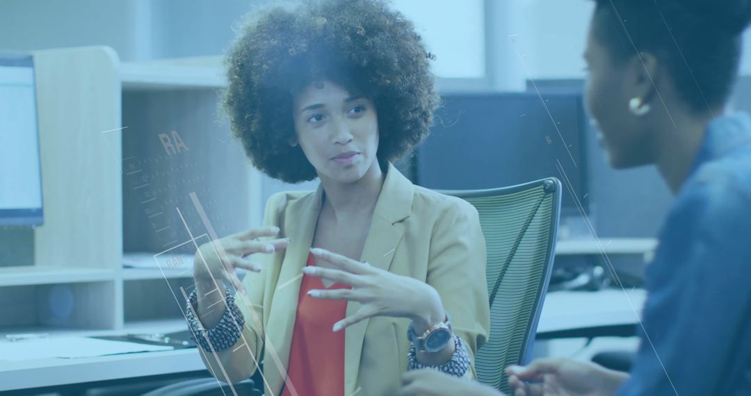 Two Colleagues Engaging in Productive Office Discussion