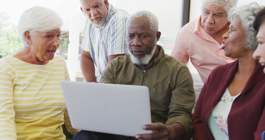 Seniors Engaging with Technology on Laptop - Free Images, Stock Photos and Pictures on Pikwizard.com