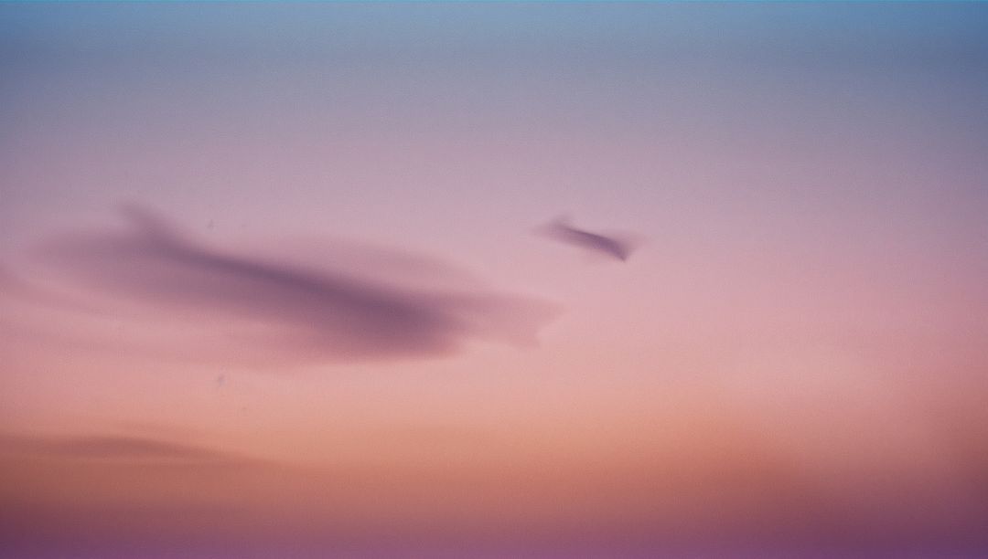 Dreamy Wispy Clouds in Pastel Twilight Sky