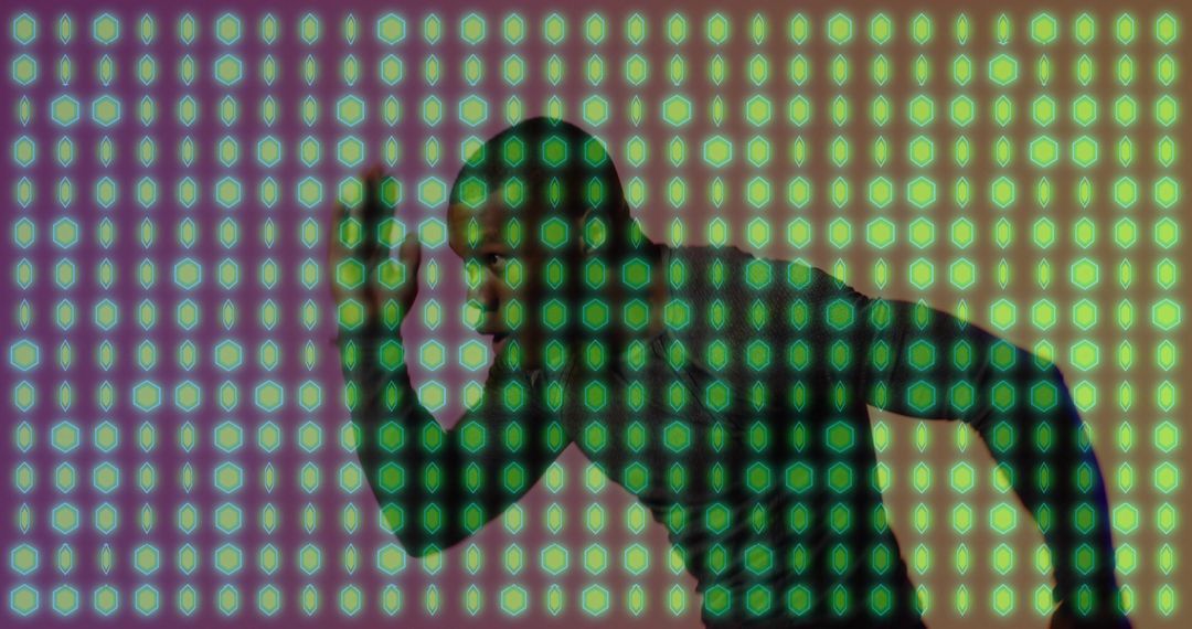 Sprinter assuming starting stance under neon green grid overlay, dynamic motion