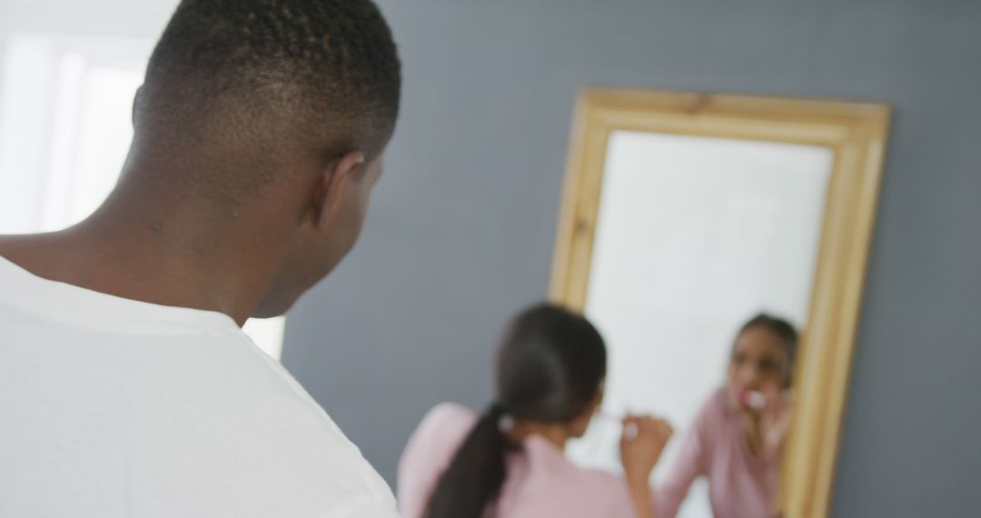 Man Watching Woman Applying Makeup in Mirror - Free Images, Stock Photos and Pictures on Pikwizard.com