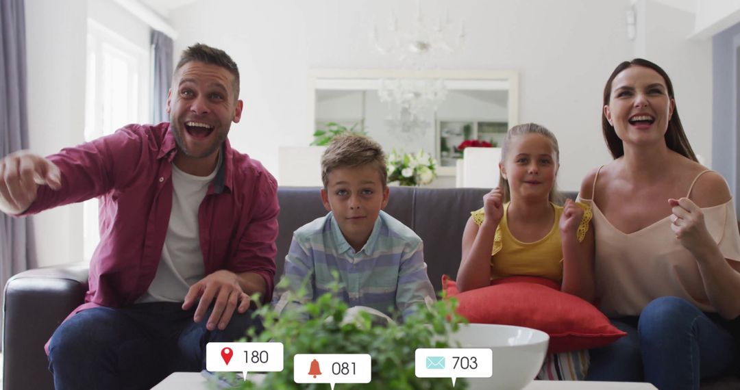 Happy Family Sharing Moments of Joy on Sofa at Home