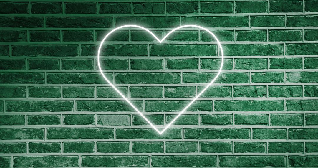 Green Brick Wall with Glowing Neon Heart Design - Free Images, Stock Photos and Pictures on Pikwizard.com