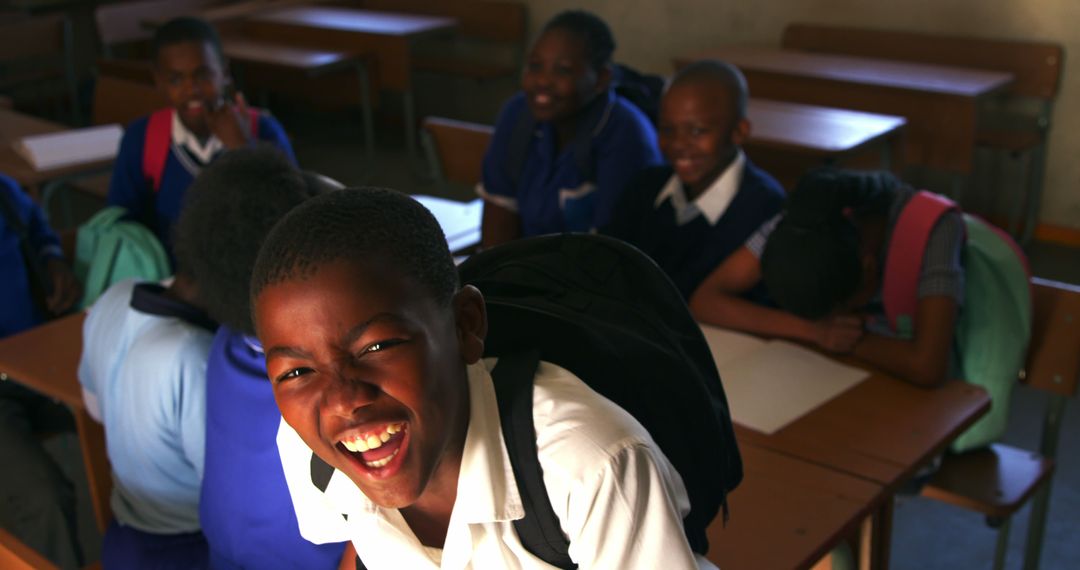 Happy African Schoolchildren in Classroom Laughing Together - Free Images, Stock Photos and Pictures on Pikwizard.com