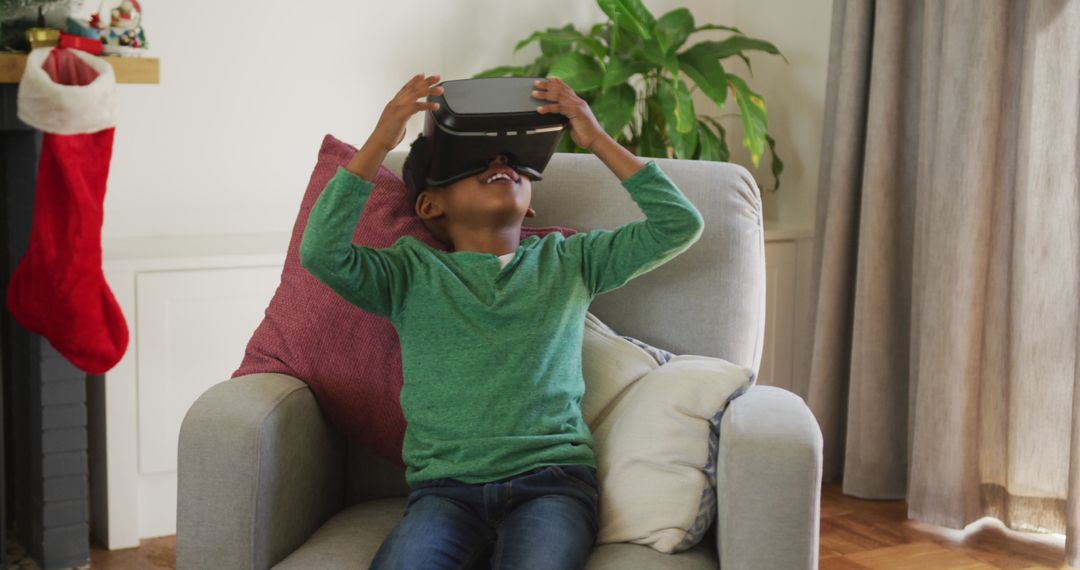Joyful Child Experiencing Virtual Reality at Home