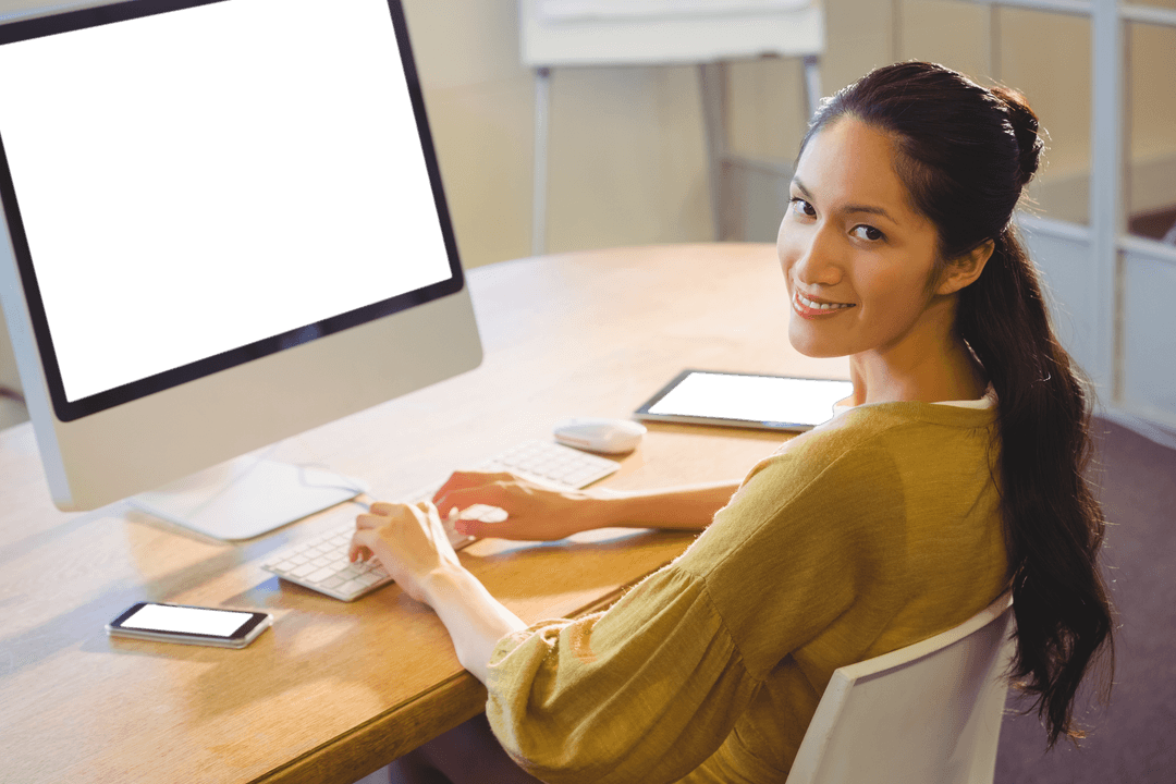 Transparent Isolated Businesswoman Smiling at Desk with Digital Devices