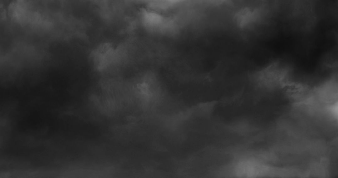Dramatic Avatar dark storm clouds looming in grey sky